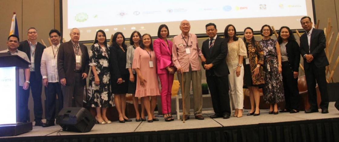 Incumbent and newly-elected Board Members pose for a photo with former PES Presidents at the closing of the 57th PES Annual Meeting and Conference.