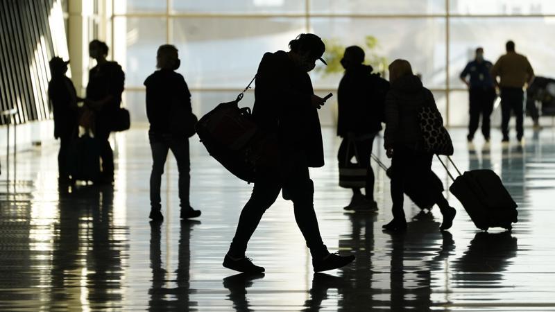 Passengers walk through Salt Lake City International Airport in Salt Lake City. (AP Photo/Rick Bowmer, from BusinessMirror)